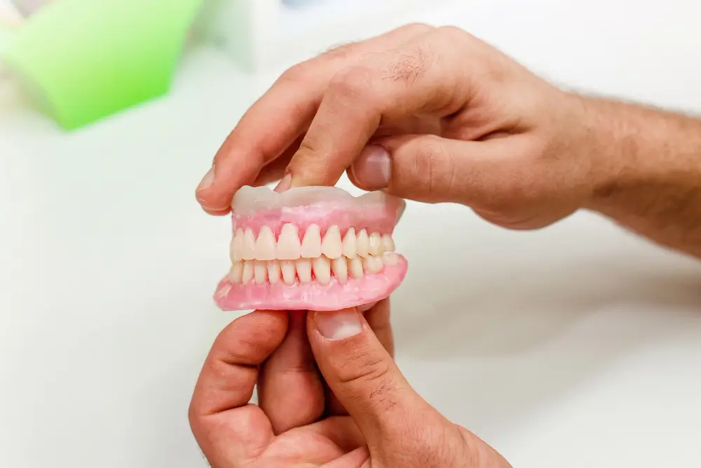 Patient with broken dentures needing same-day repair in Fairfield CA