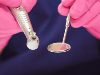 Dentist examining loose filling for replacement in Fairfield CA