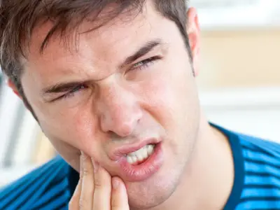 Athlete with sports dental injury needing emergency care in Fairfield CA