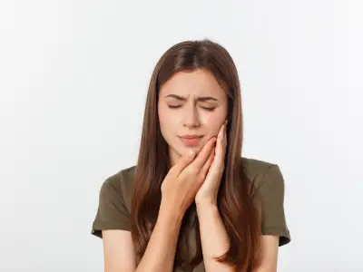 Patient with wisdom tooth pain at back of jaw in Fairfield CA
