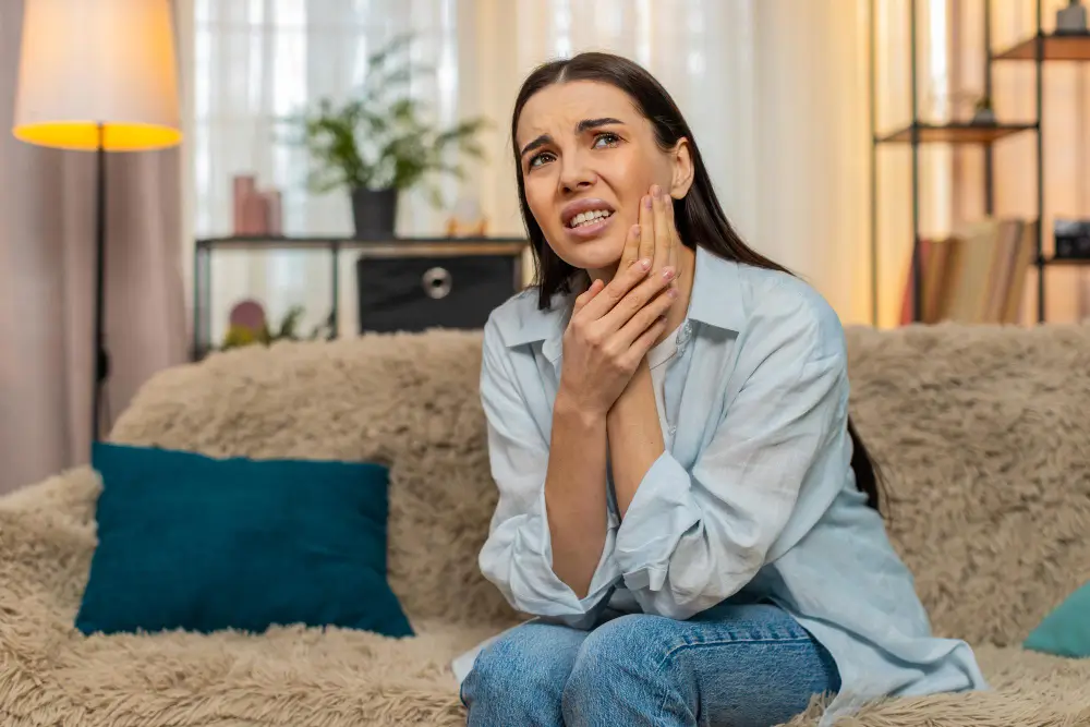 Patient with a severe toothache seeking relief in Fairfield, CA